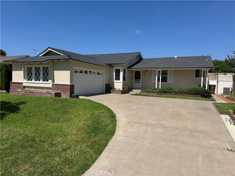 Photo of 933 W Autumn Drive, Anaheim, CA 92805 (MLS # PW26200955)