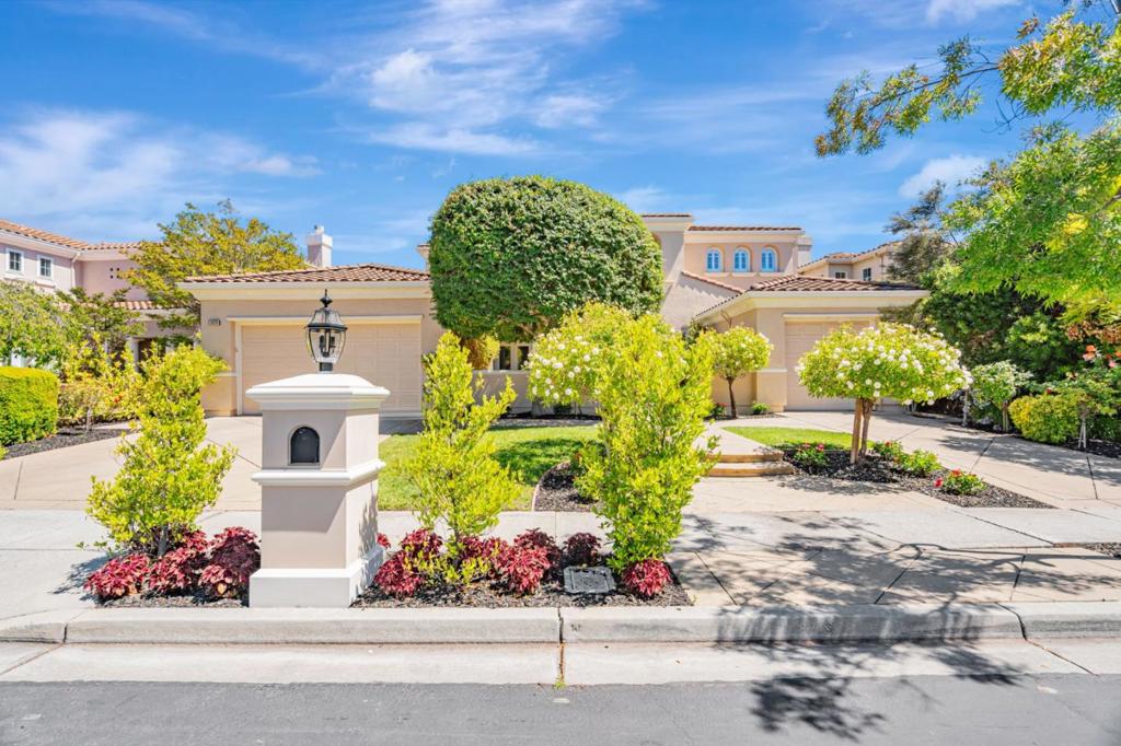 Perched on a scenic ridge in Silver Creek Valley Country Club, this spectacularly remodeled home blends luxury and comfort with epic views. From the formal entry with soaring ceilings and rich hardwood floors, every detail has been thoughtfully upgraded. The chefs kitchen has been fully renovated with custom cabinetry, elegant tile flooring, an induction cooktop, stainless appliances and an expansive island with prep sink. A walk-in pantry completes the space. The spacious family room boasts a gas fireplace, recessed lighting, and windows that flood the room with natural light. French doors in both the formal living and dining rooms open to the outdoors. The main level features two generously sized bedrooms, a beautifully updated full bath, and a guest powder room. The sweeping staircase leads to a serene primary suite with private balcony and spa-inspired bath, and a fully organized walk-in closet. Two additional upstairs bedrooms each have their own updated ensuite bathrooms. Extras: plantation shutters, double-paned windows, custom closet organizers, refreshed laundry room, and EV charger. The backyard offers room to entertain, whether hosting intimate gatherings or grand celebrations. Memberships available at SCVCC and provide access to golf, tennis, swimming, and dining.