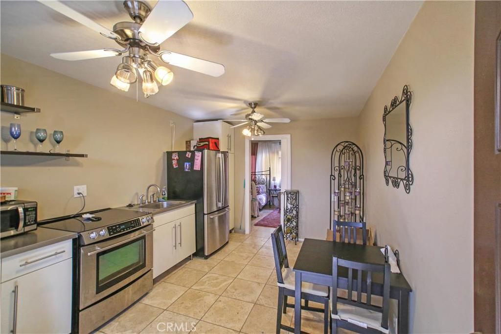 Ground Level, One Bedroom Apartment in SouthWest San Clemente on The Loop. Kitchen area with Stainless Steel Electric Range and Refrigerator. Travertine Floors and Ceiling Fans. Nice size Bedroom w/Closet that has Built-Ins. The Bathroom has a Shower Stall & small Sink. All Utilities are Included and Laundry is on the property for tenant's use. Is Located in SouthWest San Clemente, On the Loop & is Close to San Clemente Calafia Park and State Beach. Parking is Not Included. Street Parking Only. No Pets.