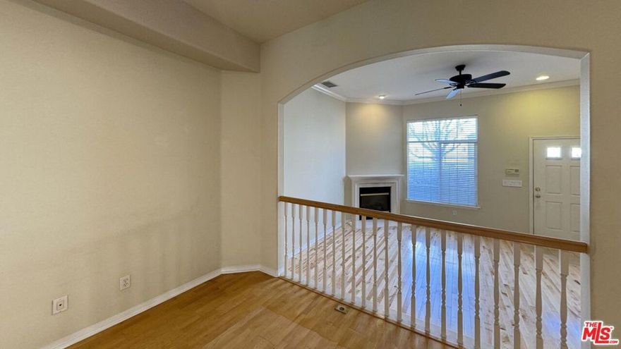 Stunning tri-level townhouse located within a gated community. The main level features an open-concept floor plan with soaring ceilings and a welcoming living room complete with a fireplace and direct access to a spacious private patio. The raised dining area flows into a light-filled kitchen equipped with a center island, abundant counter space, a breakfast nook, and a conveniently located half bath. A side-by-side washer and dryer are neatly tucked away in a dedicated closet. The first level offers direct access to the attached garage along with a versatile bonus room ideal for an office, gym, or additional storage. The top floor includes three generously sized bedrooms, each with high ceilings and large closets. The hallway showcases a beautiful skylight that fills the space with natural light and a full bathroom. The primary suite includes two closets and a private en suite bathroom featuring a soaking tub, separate shower, and double vanity. Additional highlights include central A/C and heat and two side-by-side parking spaces within the attached garage. Situated in a premier location near Fairfax, Culver City, Beverlywood, and more. Pets considered, tenant pays all utilities except water.