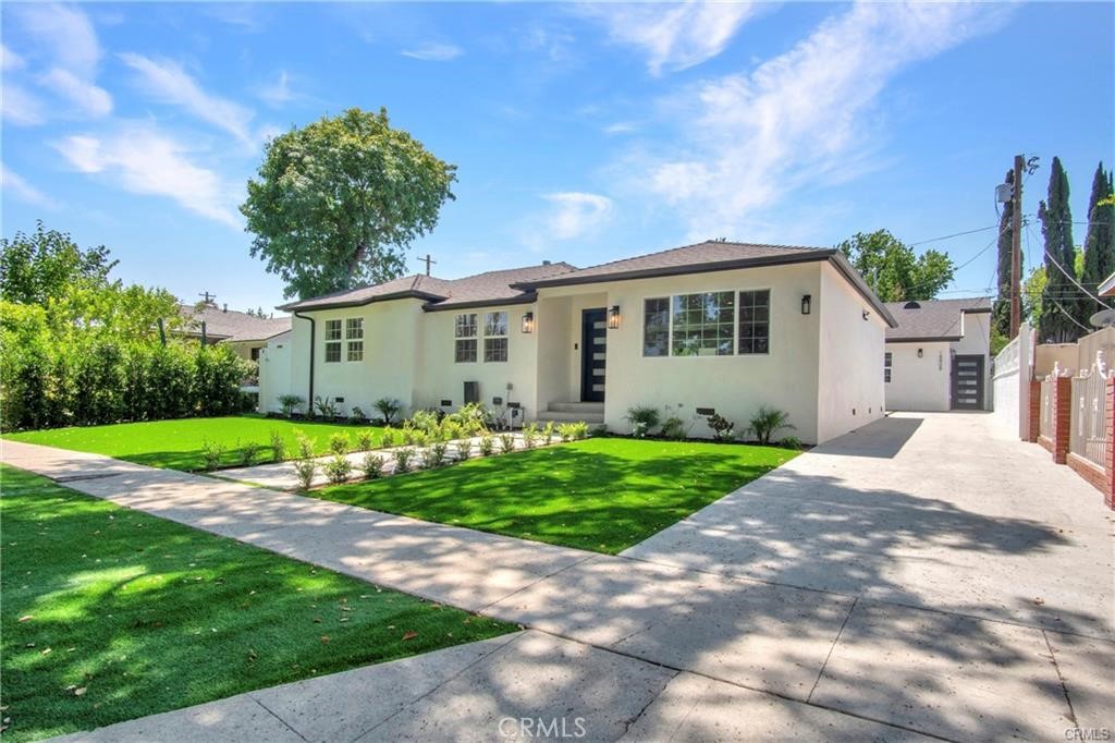 Discover this stunningly remodeled gem nestled on a charming street in Tarzana! This property features a beautifully updated main home offering 3 spacious bedrooms and 2 modern bathrooms across approximately 1,450 sq ft of open-concept living. Step inside to an inviting floor plan that seamlessly blends a stylish dining area, an elegant kitchen, and a comfortable living space — perfect for both relaxing and entertaining. Adding incredible value, the property also boasts a brand-new, fully permitted ADU completed in 2025. This separate 829 sq ft unit offers 2 bedrooms and 2 bathrooms, making it ideal for multi-generational living or as an excellent income-producing rental. ADU has separate electricity meter. With a combined total of roughly 2,297 sq ft, this is truly the best-priced home and ADU combination currently available in Tarzana. Don’t miss the opportunity to own this versatile and beautifully crafted property!