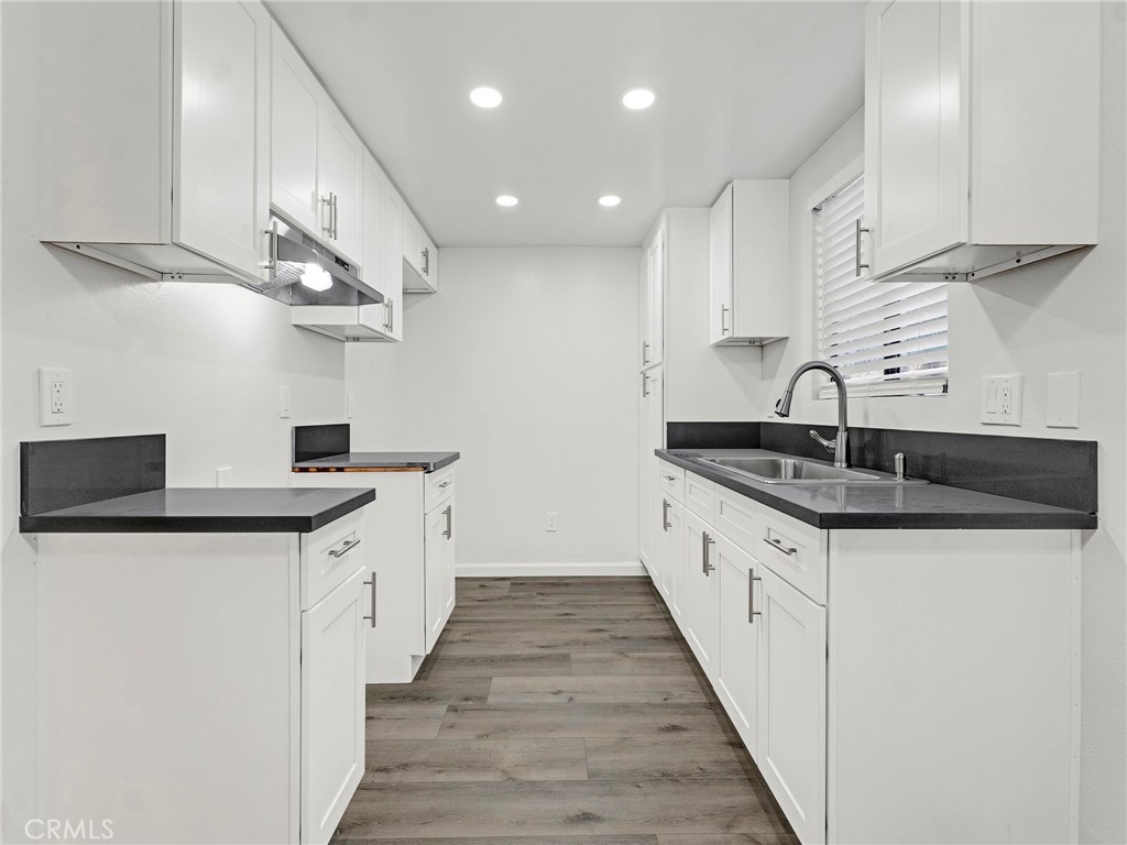 Don't miss this move-in-ready gem—beautifully upgraded and nearly 1,000 square feet of modern living across two levels. The spacious living room welcomes you with a cozy fireplace and large sliding doors that lead to a private patio—ideal for relaxing or entertaining. This freshly updated unit features: Brand new paint and stylish flooring Updated fixtures, recessed lighting, and a sleek ceiling fan Stainless steel sink and select new appliances
Central heating and A/C for year-round comfort Every detail has been thoughtfully designed to create a fresh, contemporary feel. Conveniently located near parks, schools, shopping, public transit, and major freeways, this condo offers comfort, style, and unbeatable accessibility. Easy to show go direct