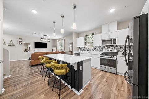 Photo of 5223 Surfwalk Way #111, San Diego, CA 92154 (MLS # 260011660SD)