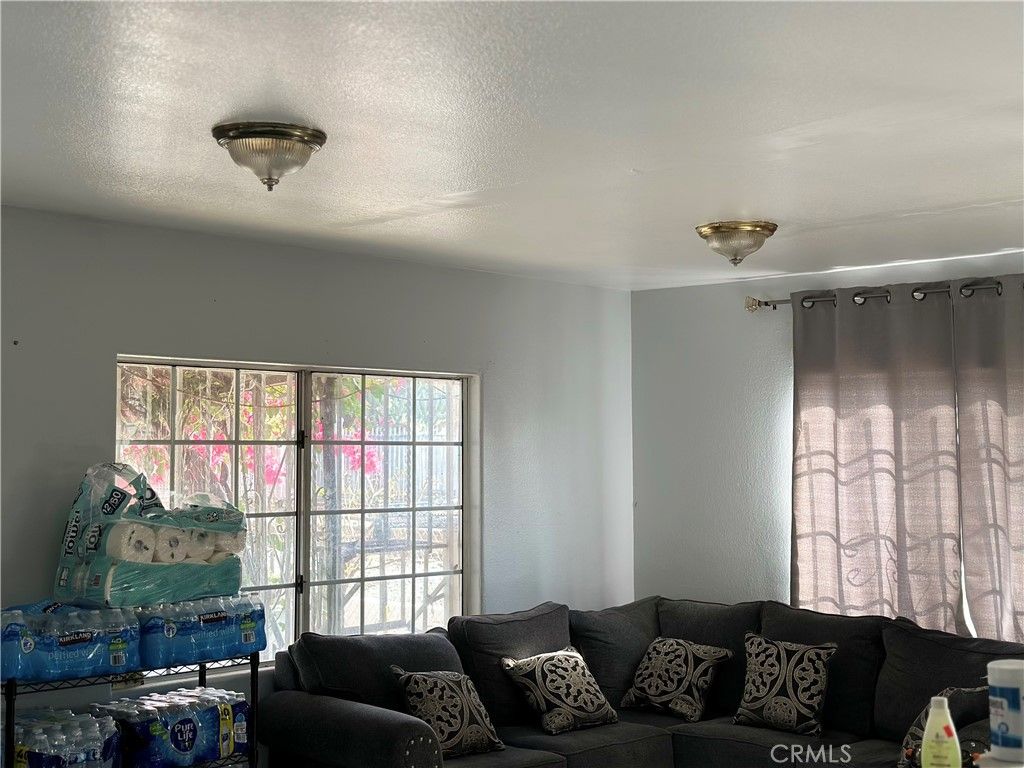 Photo of 1664 E 66th St, Los Angeles, CA 90001 (MLS # RS26081229)