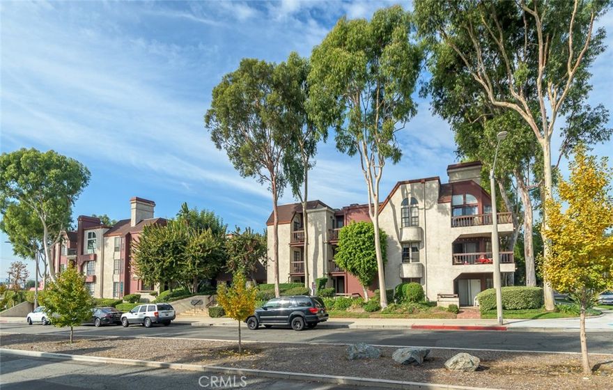 Spacious 2-bedroom, 2-bathroom condo located in one of Burbank's most sought-after neighborhoods. With 1,221 square feet of living space, this home offers a large, open floor plan perfect for modern living and entertaining. The updated eat-in kitchen features custom finishes and sleek stainless steel appliances. Beautiful wood floors run throughout the condo, adding warmth and character to the space. The bright and airy living room is complete with a cozy fireplace, creating a perfect spot to relax.The primary bedroom is a serene retreat, featuring an en-suite bathroom with a double vanity and a remodeled walk-in shower. The second bedroom is also generously sized and has direct access to a private wrap-around patio, making it an excellent space for outdoor entertaining and for hosting guests. Additional features include new washer and dryer, central air and heat and ample closet space. The unit is also pre-wired for a security system. The building offers convenient amenities such as 2 side-by-side subterranean parking spaces, extra storage for the unit, and a community spa for relaxation. Located just minutes from shops, restaurants, freeways, and nearby studios, this condo offers both comfort and convenience in a prime Burbank location.