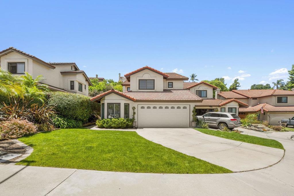 Beautifully updated and move-in ready, this 4-bedroom, 2.5-bathroom home is nestled on a quiet cul-de-sac in the heart of Village Park—one of Encinitas’ most sought-after neighborhoods. Featuring fresh interior and exterior paint, a private driveway (most driveways are shared in this nbhd), attached 2 car garage, an open floorplan with a large great room (a dividing wall was removed in the remodel, opening the floorplan), brand new carpet, and gorgeous landscaping, this home offers the perfect blend of comfort, style, and convenience. Inside, you'll find an upgraded chef’s kitchen complete with white cabinetry, granite countertops, and stainless steel appliances, ideal for entertaining and everyday living. The flexible floor plan includes three bedrooms upstairs and one downstairs, which also functions well as a home office or den. Other notable upgrades include new dual-pane windows and doors, a new central A/C and furnace, and beautifully maintained finishes throughout. The private backyard is perfect for relaxing or entertaining, with lush landscaping and plenty of space to enjoy the coastal lifestyle. Located in the top-rated Encinitas Union and San Dieguito school districts, with Flora Vista Elementary, Diegueño Middle School, and La Costa Canyon High School all nearby. Just minutes from world-class beaches, shopping, dining, and all that Encinitas has to offer. Low HOA dues of only $65/month make this an incredible value in an unbeatable location.