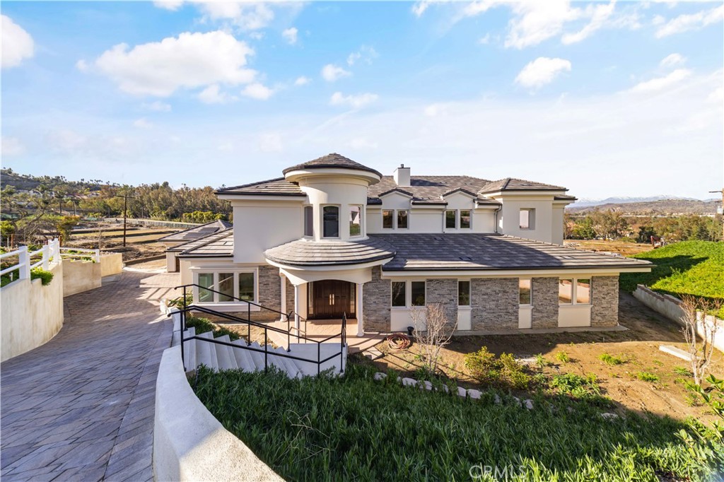 Experience Ultimate Luxury Living – Brand-New Custom Estate for Lease in Prestigious Cowan Heights
Welcome to your dream rental home in the heart of Cowan Heights—an exclusive and serene community known for privacy, prestige, and natural beauty. This brand-new, custom-built luxury estate offers over 6,000 square feet of elegant living space on nearly half an acre of beautifully landscaped grounds with stunning snow-capped mountain views.
Featuring 6 spacious bedrooms and 6.5 spa-inspired bathrooms, this residence is ideal for those who desire both comfort and sophistication. The expansive open floor plan is drenched in natural light, with soaring ceilings, floor-to-ceiling windows, and high-end designer finishes throughout.
Entertain effortlessly in the chef's dream kitchen, complete with state-of-the-art Miele appliances, custom cabinetry, and an oversized waterfall island. A separate prep kitchen offers additional convenience for hosting gatherings or special events.
The primary suite is a private oasis with breathtaking views, a luxurious en-suite bathroom, and a custom walk-in closet. All additional bedrooms are en-suite and appointed with top-tier finishes for optimal comfort and privacy.
Love entertaining or relaxing in style? The home is prepped for a home theater or wine cellar, and the vast outdoor areas are perfect for lounging, dining al fresco, or simply enjoying the tranquil surroundings.
This rare lease opportunity offers more than just a home—it delivers a lifestyle of unmatched luxury in one of Orange County's most desirable neighborhoods.
Available for immediate lease
Flexible lease terms may be considered
Unfurnished or partially furnished options are available upon request
Schedule your private showing today and make this exceptional estate your next home!