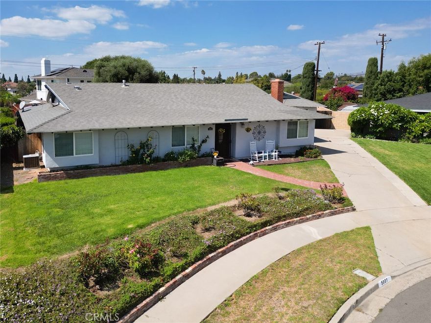 Tucked into a quiet Yorba Linda cul-de-sac, this 4-bed, 2-bath home offers comfort, charm, and thoughtful upgrades throughout. Enjoy a private backyard with green grass, a cozy fire pit zone, and a detached 2-car garage. Inside you'll find updated floors, recessed lighting, and a refreshed fireplace. The kitchen and baths were tastefully remodeled in 2020—featuring newer cabinets, vanities, fixtures, and dual-pane sliders with built-in blinds. Additional updates include a tankless water heater, paint, blinds, and a modern sprinkler system. Close to parks, schools, and town center—this is a move-in ready home with timeless appeal!