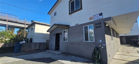Photo of 1662 E 60th ST, Los Angeles, CA 90001 (MLS # PW26141944)