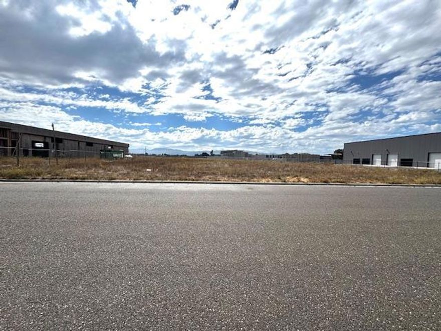 Prime Commercial/Industrial Site. This property is centrally located in Hollister's established Commercial Industrial Park and offers excellent access to major highways connecting Santa Clara, San Benito, Monterey, and Santa Cruz Counties. The region is experiencing rapid growth, driven by large-scale commercial developments, including the Amazon distribution center, as well as significant new residential housing projects.