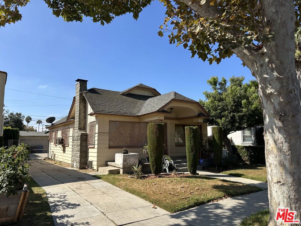 This traditional bugalow is ready to be restored to its original 1930's classic condition. Fixer. Don't miss this opportunity to transform this property. Located between Arlington Avenue and Western Avenue and south of Obama Boulevard and just north of Leimert Park. This 2-bedroom / one bath has a large living room and big kitchen with a breakfast nook. Detached garage and large backyard. The neigborhood is made up mostly of single family residences with the occasional duplex. First time on the market since 1969. No sign on property. PLEASE DO NOT WALK ON PROPERTY.
