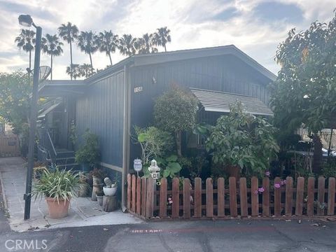 Photo of 106 Amalfi Dr, Santa Ana, CA 92703 (MLS # PW26072759)