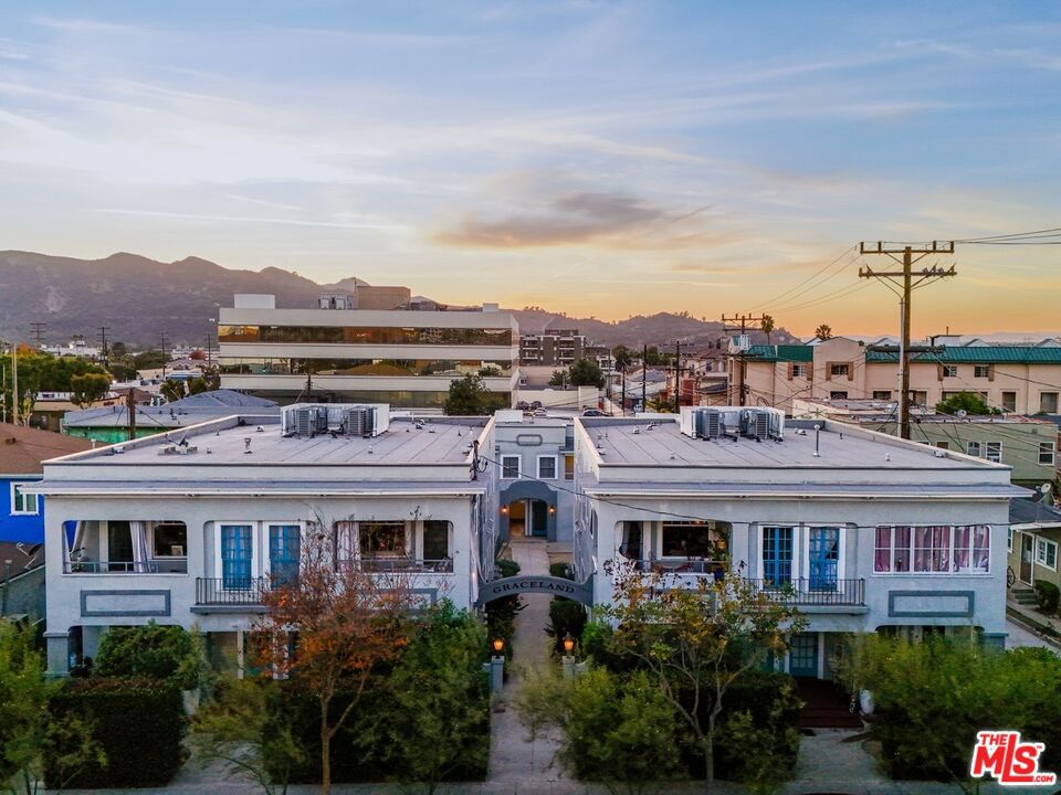 Graceland Apartments, located at 107 N. Columbus Avenue, is a charming 13-unit historic American Four Square building just one block from the Glendale Americana. The current owner has made over $1 million in strategic capital improvements, including upgrades to the electrical system, plumbing, and roofing. Spanning two parcels, the property offers a diverse mix of units: (2) 2-bedroom/1-bathroom, (6) 1-bedroom/1-bathroom, and (5) studios. With spacious floorplans, many units have been meticulously restored to cater to the area's strong tenant demand. A RUBS (Ratio Utility Billing System) program has been implemented across all units, boosting operational efficiency and allowing for a sub-30% expense ratio for future owners. The property also includes ten garages, currently generating rental income with the potential to be converted into three 2-bedroom/1-bathroom ADUs, each around 700 square feet. These ADUs could add approximately $34,605 in annual rental income. By capitalizing on market rent increases and investing in ADU construction, a new owner could see an impressive return on cost of up to 333%. ***Assumable Financing Available***