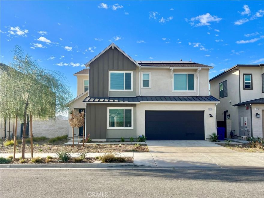 Newer luxury single family home within the Five Points at Valencia. Now move-in ready!
This stunning property offers a generous 2,800 square feet of living space, providing room for comfort and relaxation. With 4 bedrooms and 3 full bathrooms, there is ample space for the entire family to enjoy. The house is adorned with luxurious Vinyl Plank Flooring throughout except on bedrooms. For your guests, this home includes a bedroom and full bath downstairs. The expansive open kitchen is a chef's dream, boasting Wolf and Sub-Zero appliances, add to the luxury of this beautiful new home. Additionally, you can enjoy entertaining or lounging in the upstairs open loft! The primary suite will provide the perfect setting for relaxation, the master retreat offers a peaceful oasis. This home is not only beautiful but also energy efficient, boasting a tankless hot water heater, programmable Ecobee smart thermostats, and solar panels.
The great community offers so much! Pools, spa, club house, multimodal paths, gardens and a playground. Located minutes from I-5, Six Flags Magic Mountain and Valencia Westfield Mall. Easy access to shopping, dining, entertainment and highly-rated schools. Don't miss out on this extraordinary opportunity and schedule a tour today!