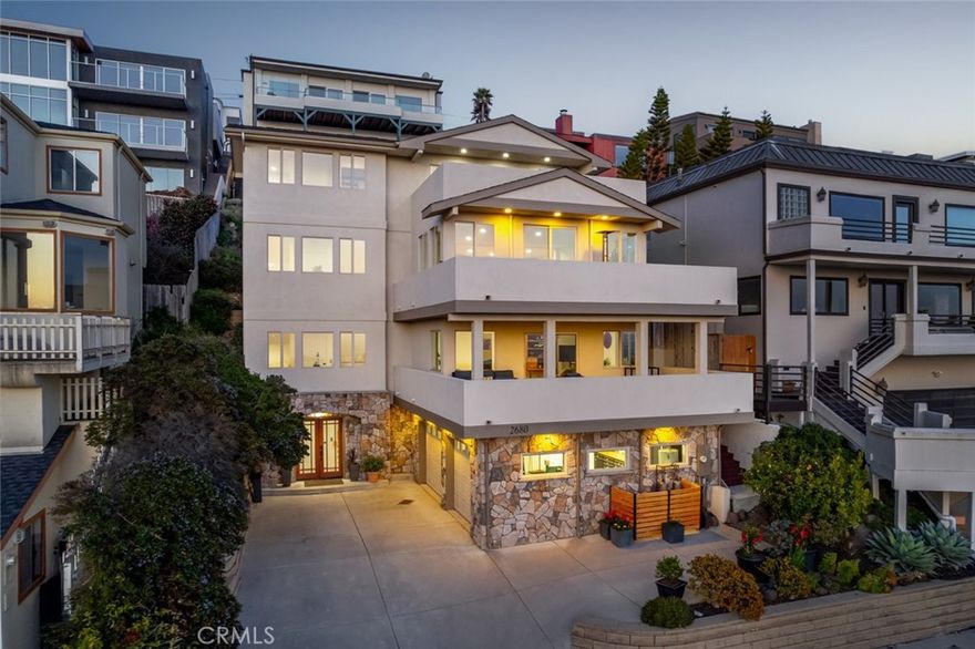 Commanding a prime hillside position in North Morro Bay, this luxurious four-story home was designed around its breathtaking 180-degree ocean views, visible from every level and from three expansive private decks totaling nearly 900 square feet. From dawn’s first light to the glowing hues of twilight, take in the waves, dolphins, whales, and ever-changing Pacific stretching from Montana de Oro to Cayucos. An elevator connects all floors, making access effortless. The main level features hardwood floors, large picture windows framing the ocean, and a spacious deck ideal for dining and entertaining. The chef’s kitchen showcases cherry cabinetry, granite countertops, and premium appliances, including a JennAir range, Thor exhaust hood, and Bosch 800 dishwasher. On the second floor, a welcoming family room opens to a covered ocean-view deck large enough to serve as an outdoor living room. Two guest bedrooms and a full bath provide a comfortable retreat for visitors.The top-floor primary suite spans the entire level, offering a spa-inspired bath and a secluded deck where you can watch the sun melt into the sea. Set at the end of a quiet cul-de-sac bordering open pasture and just minutes from the sand, this 3,237-square-foot retreat captures the essence of the Central Coast—where luxury meets laid-back coastal living. Price has been reduced by $145,000.
