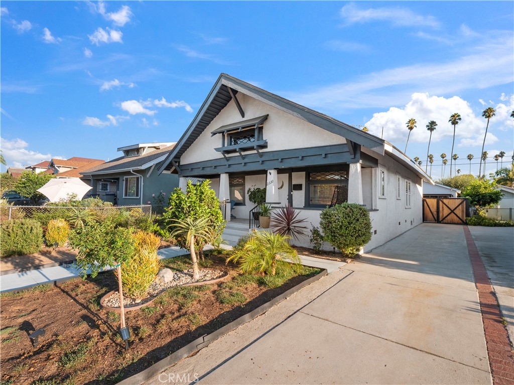 Step into a rare blend of historic charm and modern luxury in the heart of Jefferson Park’s HPOZ at this stunning 3-bedroom, 2-bath Craftsman-style bungalow. A spacious, inviting front porch welcomes you before you even step inside—perfect for morning coffee, relaxing afternoons, or simply enjoying the charm of this historic Craftsman street. As you enter, the living room showcases stunning beamed ceilings with elegant crown molding and intricate paneled detailing overhead, creating a warm yet sophisticated feel. As you flow into the kitchen, the ceilings rise even higher, enhancing the open, airy ambiance and making the heart of the home feel even more inviting. Remodeled around 2022, the residence boasts a host of upgrades, including a newer tankless water heater, newer 200-amp electrical panel, as well as fresh cosmetic enhancements like interior/exterior paint, newer flooring, upgraded landscaping, fully renovated kitchen and bathrooms, recessed lighting throughout, and the foundation was redone in 2024. The chef’s kitchen showcases modern cabinetry, quartz countertops, newer appliances, and flows seamlessly through French doors to an entertainer’s backyard complete with a built-in grill and pergola attached to the east side of the garage providing tons of shade for more entertaining or relaxation. The spacious primary suite also opens via French doors to the backyard, creating a perfect indoor-outdoor retreat. The detached 2-car garage is a rare find in this neighborhood and is finished with a half bath, electricity, plumbing, and gas hook-up already in place—ready and ideal for a future ADU conversion. Ample driveway parking adds even more convenience, and there is no need for parking replacement if garage converted into ADU.
This property is just minutes from the Metro Expo and K Lines, providing quick access to Downtown LA, Hollywood, Santa Monica, USC, and SoFi Stadium. With its blend of historic character, thoughtful updates, and unbeatable location, 2330 W 29th Pl offers the best of Los Angeles living—with built-in potential for future value.