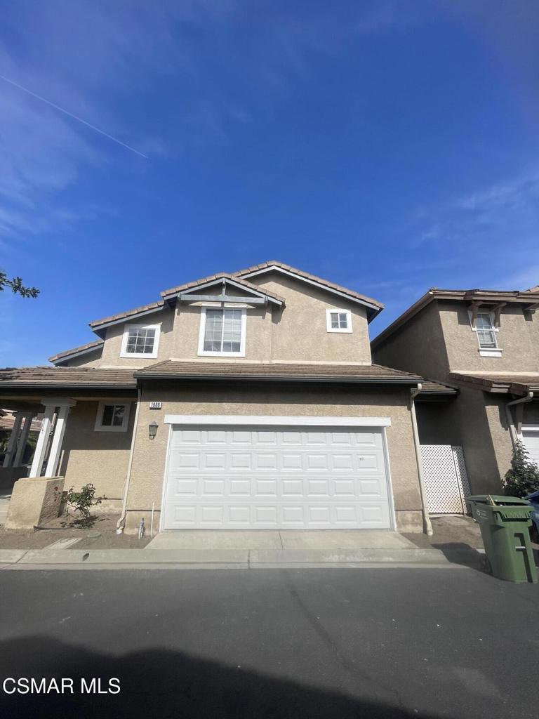 This exquisite move-in ready two-story residence is nestled within the highly sought-after gated Parklane Community. As a private end-unit with no shared walls and a peaceful street location, this home offers the perfect blend of comfort, convenience, and tranquility.Step inside to be greeted by soaring vaulted ceilings and a bright, airy living room that flows seamlessly into the dining area. Sliding glass doors invite you to a charming, low-maintenance backyard with a cozy patio--ideal for morning coffee, weekend BBQs, or simply relaxing in your own private retreat.The kitchen features generous cabinet space and a convenient breakfast bar, making meal prep and casual dining a breeze. Upstairs, you'll find three spacious bedrooms and two full bathrooms, including the inviting primary suite designed for rest and relaxation.Living in Parklane means more than just a beautiful home--you'll also enjoy resort-style amenities, including a sparkling community pool and spa, basketball courts, and a playground, all set within a lush, park-like setting.This gorgeous home is move-in ready and available for immediate occupancy. Don't miss your chance to make it yours!