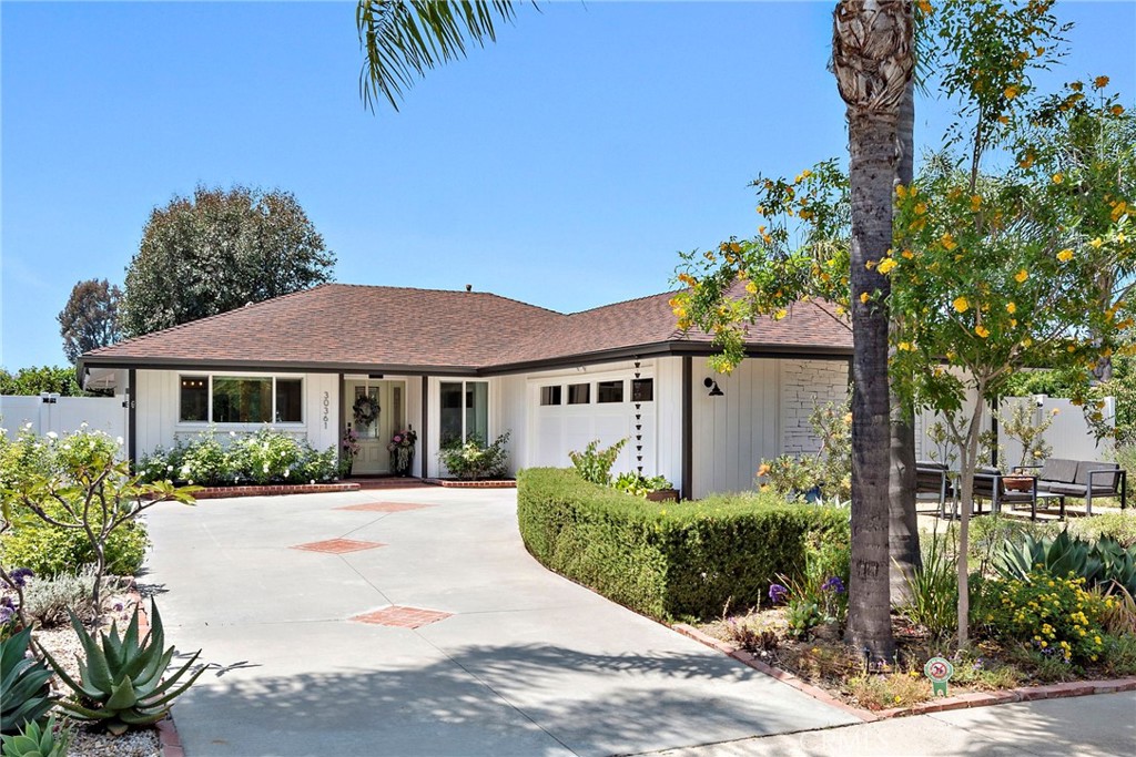 Experience California Living at its Finest! This beautifully remodeled "Single-Level Home" is situated in the heart of Laguna Niguel. This fully remodeled single-level home is nestled on a peaceful single-loaded street in one of Laguna Niguel's most private and serene settings. This beautifully upgraded home features 3 spacious bedrooms and 2 modernized bathrooms, designed with comfort and style. Step inside to a light and airy open floor plan showcasing a completely renovated gourmet kitchen, complete with Bosch stainless steel appliances, Quartz countertops, roll-out shelving and elegant finishes throughout. No detail has been overlooked from new fresh interior and exterior paint, new flooring, PEX repiping, whole house fan and attic fan, new exterior vinyl fencing and epoxy-coated garage flooring with built in cabinetry. This open floor plan offers seamless indoor-outdoor living, ideal for both entertaining and everyday relaxation. Beautifully landscaped front and backyard oasis with colorful rose bushes, lush greenery and mature fruit trees. It is the perfect retreat to unwind or host gatherings. Enjoy the benefits of NO HOA Dues, a Low Tax Rate, and a prime location close to award winning schools, world renowned resorts, beautiful beaches, and top-tier shopping, restaurants and entertainment. This immaculate home is move-in ready and radiates pride of ownership. Do not miss your opportunity to own this exceptional property in one of Laguna Niguel's most tranquil and desirable neighborhoods.