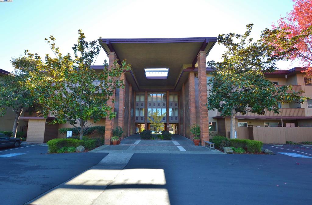 PRICE REDUCED!! Located at the end of Webster Street, with easy access to its vibrant dining and shopping options, Park Webster is a gated community of condominium homes. This ground floor unit boasts an updated kitchen, lots of new flooring, a spacious bedroom with two generous closets, and a living room/dining area space. A generous patio has a roomy storage closet, and the deeded parking space is located close to the unit. Beautiful grounds surround the community pool. Commute options such as AC Transit and the ferry are close by, as are Washington Park, Crown Beach, and breweries, restaurants and shopping at the Point. The farmers market is just a few blocks away. This is your opportunity for convenient modern home ownership in the heart of Alameda's West End.