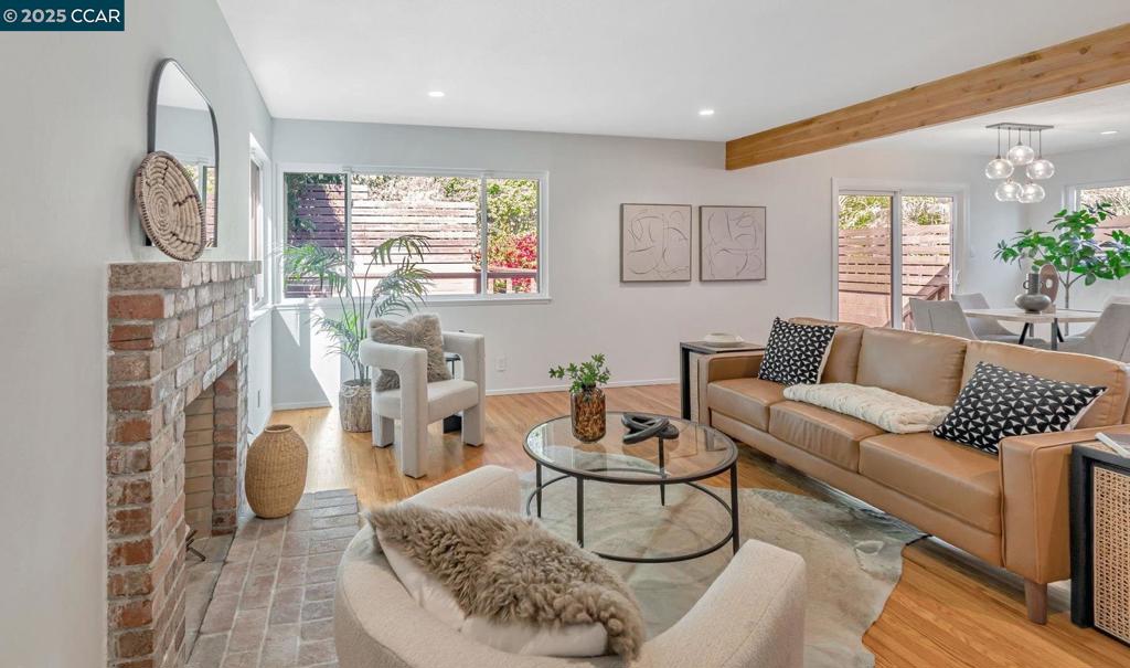 Classy and casual home with designer finishes and a touch of traditional, creates this well-appointed living space in Redwood Heights. Tucked away from the street. The owners spared no expense with smart technology entry system and other modern enhancements. Old meets new with the original brick fireplace and exposed beams, pared with the updated kitchen, chef's island, newer appliances, and stone countertops. Backyard living is private and includes a patch of green for your garden or relaxing. This tastefully updated space is yours for living and entertaining. Stake your claim and enjoy a peaceful respite. Open house this Sunday 1:00pm-4:00pm.