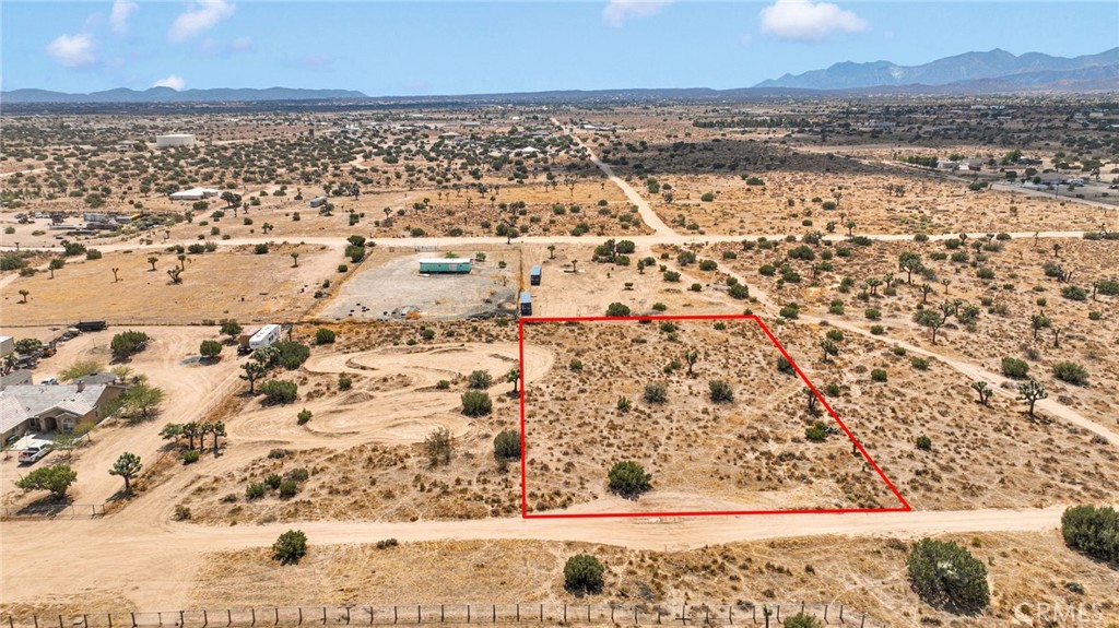 Discover the possibilities with this 0.94-acre vacant lot in Phelan. (APN: 3070-531-10-0000). Nestled in a peaceful desert setting, this parcel offers open views of the surrounding mountains and wide-open skies, perfect for those seeking privacy and room to build. With plenty of space for a custom home, ranch, or weekend retreat, this property is an excellent opportunity to create your vision in a growing area of the High Desert. Enjoy the quiet lifestyle while still being within reach of shopping, dining, schools, and major roadways for commuting. Whether you’re looking to invest or build, this 0.94-acre lot provides a blank canvas for your next project. Neighboring lot is also available (APN: 3070-531-11-0000)