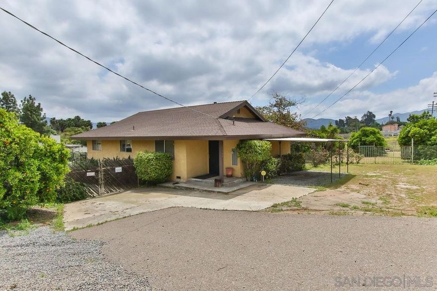 Price Improved, Now $535,000 for this Rancho SD Charmer! This charming property has the potential you have been looking for!  It features a large .89 acre lot, a great Rancho San Diego location, a 1218 sq ft home with 2 bedrooms and 2 baths (w/ potential for a 3rd bedroom) a detached garage, shed, a large carport and fruit trees. Whether you are looking for your first home, an investment opportunity or a place to live and run your own business, this property has it all!  The home has a great layout with a spacious kitchen, dining area and living room. Just off the living room you will find a full bath and bedroom for guests. Down the hall is the master suite with ensuite bath and a sliding glass door to the large deck area over looking the yard. Don't miss the chance to own this Rancho SD property! Equipment:  Shed(s) Other Fees: 0 Sewer:  Septic Installed Topography: LL