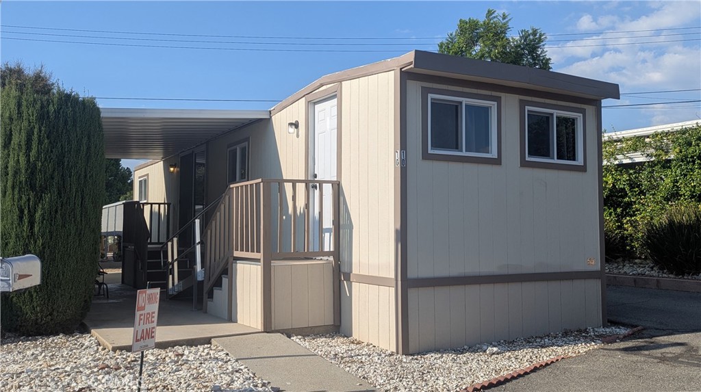 **LAUNDRY HOOKUPS ADDED** Simple senior (55+) living at it's finest! Located in the Park Terrace senior mobile home park, this beautifully remodeled 1 bed/ 1 bath single-wide hosts a variety of features and upgrades rarely found in homes of it's type! Remodel improvements completed just 1 year ago include new double-pane windows, recessed lighting, kitchen cabinets, counters, sink, and faucet, new switches and outlets, new range & hood, new vanity, toilet, and shower surround, freshly coated roof, fresh paint inside & out, new water heater, laminate wood flooring, and so much more! Additional nice-to-haves include a bonus room/ office, front door access ramp, patio cover, and storage shed. It's move-in ready for the buyer who's ready to move! Space rent is nice and low too, sitting at just $370.55/ mo! Call to schedule a showing today!
