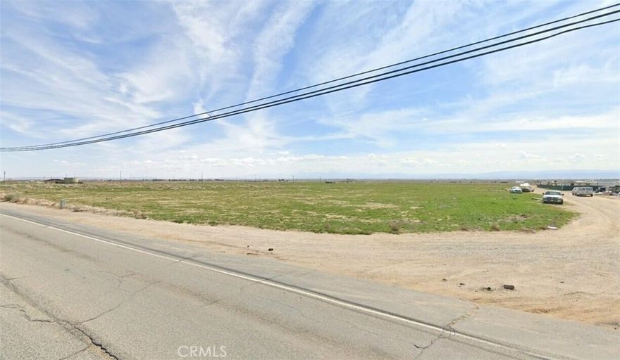 29.28 acre lot zoned for 2.5 acre residential lots and agriculture. Great investment for a possible future tract of homes, family compound, or horse ranch. Paved frontage on Rosamond Blvd with power in the street. APN 375-140-02.