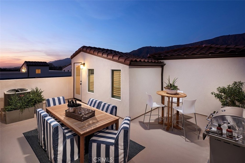 This beautifully updated 3 bedroom, 3.5 bathroom condo in north Glendora features foothill & mountain views from both your private rooftop deck and the primary bedroom. The open living areas feature a large living room, dining area and a chef's kitchen with a center island. The primary suite and 2 guest bedrooms are located on the 3rd floor. The front door and direct garage entries are at ground level, where you will walk into a bonus room with a handsome 1/2 bath. The 2 car attached garage is oversized and wired for an electric vehicle charger. Built in 2017 as a green-living space of solar efficient homes, big energy savings are offered to the residents. This gated community has a pool, BBQ area, children's park and a dog park, and is conveniently located less that 1 mile from Glendora's village area, close to Azusa Pacific University, Citrus College, the Metro Gold Line Station, the 57 and 210 freeways & Glendora Unified schools.