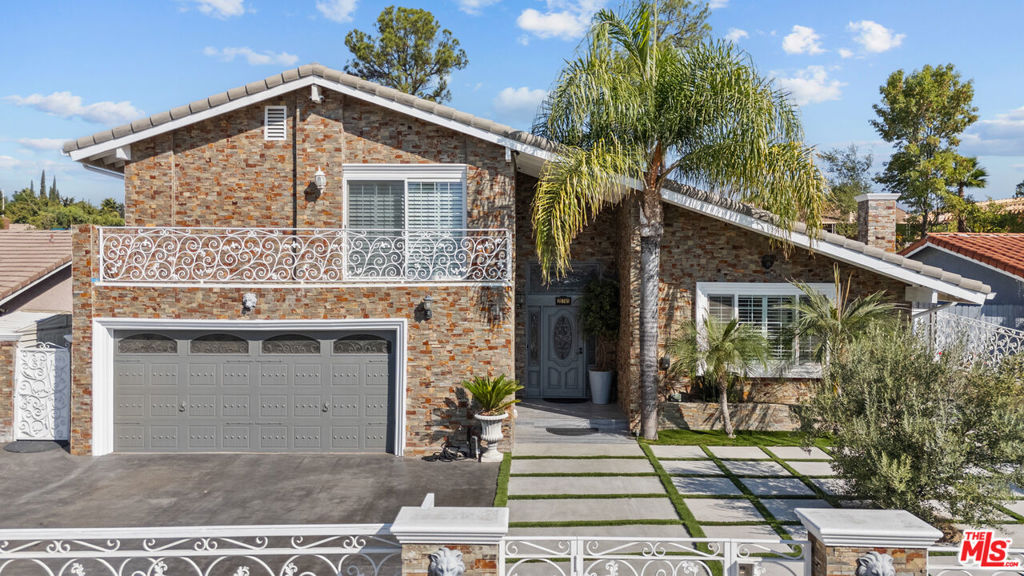 Welcome to this updated entertainers home which features tons of upgrades, Shutters throughout the home, paid off solar panels, Viking appliances, gorgeaus chandliers, recessed lighting, granite counter tops, updated bathrooms, laundry down stairs and upstairs, an Italian marble custom fireplace, Verde Butterfly granite stairs, 2 master suites, smart toilets in master bath, custom self closing closet in master retreat, an amazing tiled pool with water features and grotto perfect for enjoyment, a beautiful outdoor kitchen with patio custom made with grey Italian marble with built in BBQ and appliances, exterior stucco crystal white smooth finish, this home is a must see, open concept living, Milgard windows with a lifetime warranty. Two central air units. This one of a kind home features lots of custom bold designs and pride with ownership. Close to Sierra High School, Germain Academy For Academic Achievement, Earnest Lawrence Middle school and Chatsworth Charter High School. Nearby shops and various dining restaurants.