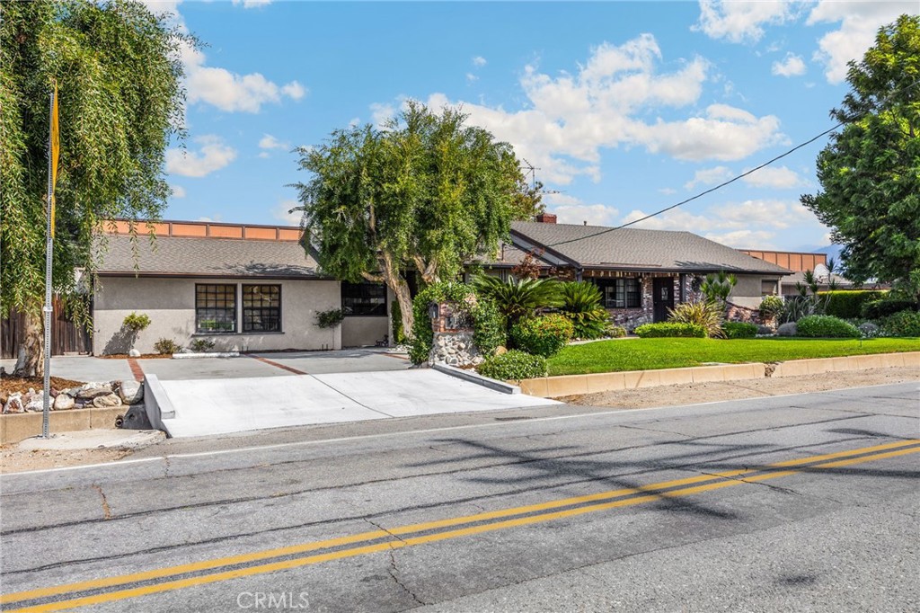 Don’t miss the opportunity for this custom ranch style 4-bedroom, 2.75 bathroom pool/spa home that offers 2,931 sq. ft. of living space on over half an acre, spread across two lots. It features hardwood floors and custom oak details throughout as well as two fireplaces, and spacious living areas. Outside, relax by the pool/spa, entertain on the patio with built-in BBQ, or roast S’mores over the fire pit. For hobbies and projects, the property features an estimated 900 sq. ft. garage/workshop plus a 400 sq. ft. barn—ideal for contractors, large projects, or extensive storage. With plenty of room for RV parking and toys, this home is a dream setup for off-road enthusiasts. Lastly, if you're searching for the perfect place to build an ADU this is it. Hurry this one truly won't last long.