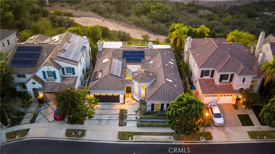 Rebuilt in 2018, this fully renovated single-level luxury residence is located in the prestigious, guard-gated Bonita Canyon community of Newport Beach. This exceptional home has been structurally transformed, with seven interior walls removed to create an expansive, open-concept layout that blends modern elegance with functionality. To support this architectural reimagining, new steel beams were expertly installed, ensuring both durability and design integrity. Completely updated plumbing, piping, and electrical throughout.



The home is bathed in natural light, thanks to the addition of five skylights—bringing the total to Six—strategically placed to enhance the home's bright, airy atmosphere. All plumbing and piping throughout the home have been completely replaced, offering peace of mind and long-term reliability.



Designed for effortless indoor-outdoor living, the home features three oversized folding glass doors—in the breakfast nook, family room, and primary suite— opening to tranquil canyon, city light views and courtyard. The chef’s kitchen is equipped with a premium Sub-Zero double French door refrigerator, wine-frige and each bedroom and the garage feature custom California Closets built-ins for optimal storage and hige-end inteior finish.



The entire home is powered by a full Savant smart system—giving you control of lights, TVs, audio, and security from your phone. Additional smart features include Curtain Remote Controls, Smart Toilets, e-lock with fingerprint access at front gate, Garage MyQ Remote Control, Water Purifier, fully paid Solar Panels, and a Tesla Car Charger.



The primary living room, bedroom, and bathroom lighting fixtures have been updated with contemporary designs. Two new glass-enclosed patios with integrated heaters and curtains extend the living space outdoors, offering elegant, year-round entertaining options. Home office can be converted to #4 bedroom if needed. 2 newly built-out patios adding extra appr 500SF living space. 



Located minutes from world-renowned Fashion Island and major freeways including the 405, 73, 55, and 22, this home offers both unmatched convenience and privacy. With the cool ocean breeze flowing through Bonita Canyon, air conditioning is rarely needed—but always available for your comfort.



Don't miss your opporunity to this rare single level home offering combines extensive structural upgrades, luxury finishes, and smart innovation in one of Newport Beach’s most desirable communities.