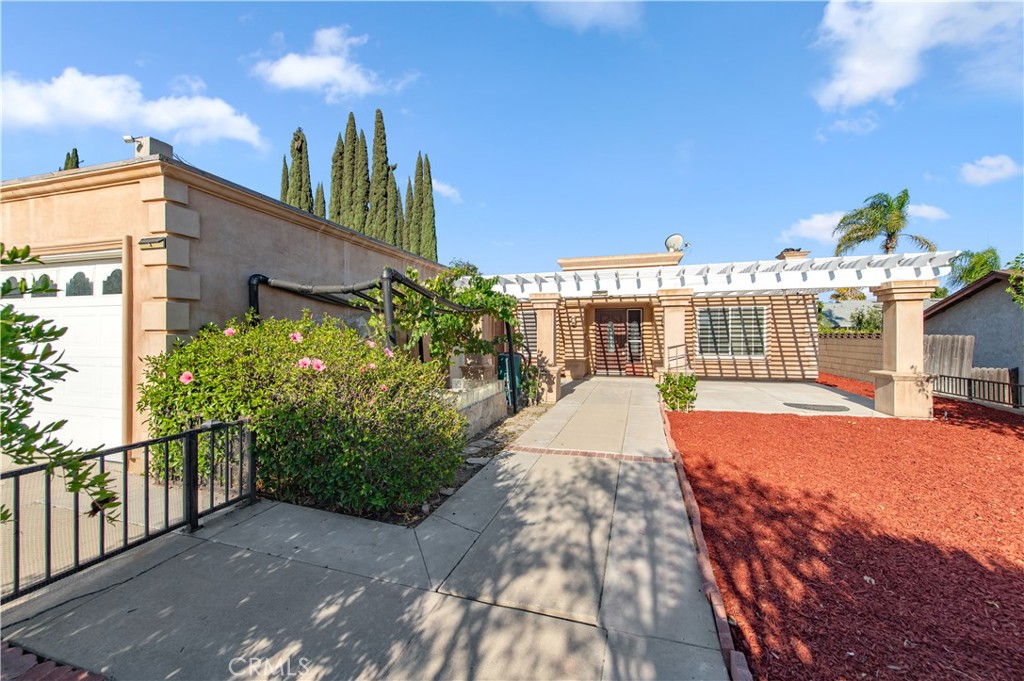 This charming home is located next to the Diamond Bar Golf Course. 18 years first time on the market. A cozy single-level layout features a private, gated front yard filled with lots of fruit trees. Recently updated with brand-new flooring, fresh paint, and modern bathroom vanities. The home offers 4 bedrooms and 3 full bathrooms, including a private suite with a separate entrance—this room is ideal for rental income, potentially generating $1,000 per month. Conveniently situated near Sprouts Market, restaurants, and with easy access to the 60 and 57 freeways. An excellent value and a perfect first-choice home!
