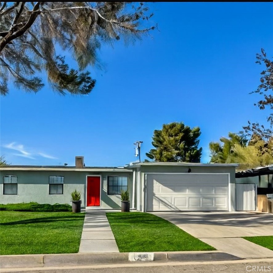 Updated 3-bedroom, 1-bath single-family residence on a 9,408 sq ft lot. The home offers an open-concept layout with a remodeled kitchen featuring stainless steel appliances, modern cabinetry, and updated finishes. The bathroom has been renovated with contemporary fixtures. Flooring throughout the home has been upgraded. The fenced backyard includes an in-ground pool and jacuzzi. The property is in move-in condition and provides functional indoor and outdoor living spaces.