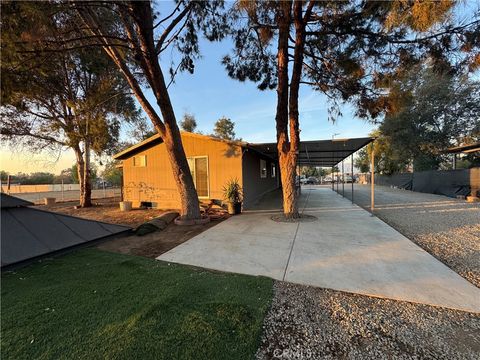 Photo of 28886 Zena Pl, Nuevo, CA 92567 (MLS # SW26099153)