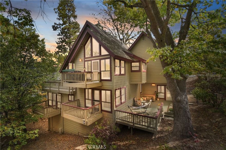 Welcome to one of Lake Arrowhead’s most loved neighborhoods — Tavern Bay! Surrounded by graceful oak trees and mountain sunshine, this beautiful home offers a wonderful mix of comfort, space, and a true sense of mountain living.



You’ll love the level entry that opens into a bright and airy living room with vaulted ceilings, a cozy fireplace, and decks that stretch out into the trees. The country kitchen has plenty of space for cooking and gathering, making it the heart of the home.



With over 3,100 square feet, there’s room for everyone. The downstairs level features a large family or game room with its own butler’s kitchen, fireplace, and private deck—perfect for guests, entertaining, or relaxing. The primary bedroom suite is located here as well, offering privacy and comfort. Two additional guest rooms, another full bath, and the laundry area complete this level.



Outside, the oversized lot provides a sunny setting with just the right amount of shade. It’s an easy walk to Tavern Bay Beach Club, the lake, and nearby trails—ideal for enjoying all that Lake Arrowhead living has to offer.



Additional features include:

   •   Three-car garage with Electric Car Charging 

   •   Driveway approach completely redone

   •   Natural gas backup generator

   •   Air conditioning & whole house fan

   •   Storm doors and electric blinds for vaulted windows 

   •   Fireplace with gas logs, easily converted back to wood-burning

The home also has solar and can either be assumed as a lease or you can be pay it off, negotiate it into the deal.  Low energy cost and efficient in this sunny location.





This home has been lovingly cared for and is ready for its next chapter—whether you’re looking for a full-time residence or a peaceful mountain getaway, 28220 Bern Lane is the perfect place to call home.