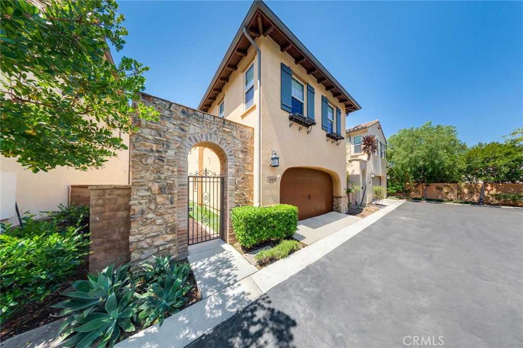 Nestled in the scenic hills of San Juan Capistrano, this beautifully appointed home is located in the private, gated community of Campanilla @ San Juan Hills. The property offers the perfect blend of modern comfort and timeless style - with newer construction, an open floor plan, authentic hardwood floors, plantation shutters, high ceilings, cozy fireplace and delightfully peaceful & quaint backyard. The sumptuous primary suite features dual sinks, dual walk-in closets, a soaking tub, and a tiled shower — your own spa retreat. Two privately situated guest rooms share proximity to a versatile loft area, ideal for a home office, media lounge, or play space. Thoughtful upgrades include a whole-home water softener and filtration system, recently installed solar panels. Community amenities include an updated sports court with pickleball, basketball, and volleyball, plus a children’s playground. All of this is just minutes from the charming shops, dining, and historic attractions of downtown San Juan Capistrano. Information deemed reliable, buyer to verify.