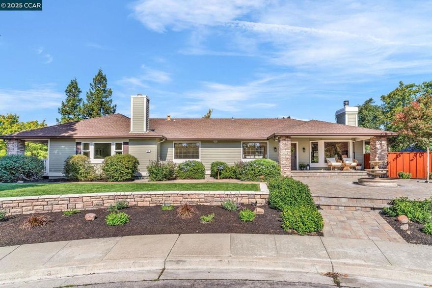 Stunning Single-Story Home in Coveted Tassajara Ridge, perfectly situated on a peaceful court with a charming wrap-around covered porch invites you to relax and take in the serene surroundings—perfect for morning coffee or starlit evenings. Inside, the home features a spacious formal living and dining room with a striking rock fireplace with gas starter and French doors leading to the porch, seamlessly blending indoor and outdoor living. The updated kitchen showcases quartz countertops, bar seating, new cooktop & hood, hardwood floors, a large pantry, and a cozy breakfast nook with access to the covered porch. Luxurious Primary Suite is a tranquil retreat with sliding glass doors that open to the porch, walk-in closet, recessed lighting, and a beautifully updated bathroom suite featuring a soaking tub, glass-enclosed shower, & dual-sink vanity.Two spacious secondary bedrooms share an updated bathroom with quartz countertops. The expansive great room impresses with vaulted ceilings, French doors to proch, fireplace, abundant natural light—ideal for entertaining and gatherings. Enjoy the thoughtfully designed backyard with a large grassy area, a large garden box, gazebo, and built-in BBQ. There’s ample space to add a pool or even an ADU- endless possibilities. OH Fri 5-7, Sat & Sun