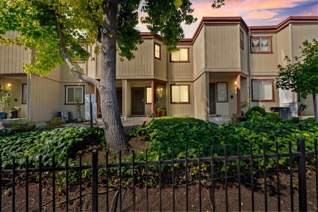 Charming 3-Story Townhouse-Style Condo in Hayward Welcome to 20917 Locust St Unit D, Hayward, CA 94541 a stylish and functional 3-story townhouse-style condo thats perfect for first-time buyers or anyone seeking convenience and comfort in a central location. Nestled on the Hayward/Castro Valley border, this 2-bedroom, 1.5-bathroom home offers 1,101 square feet of well-designed living space with easy access to both I-580 and I-880. On the main floor, youll find two comfortable bedrooms and a full bathroom. Upstairs, the light-filled upper level features an updated kitchen with sleek quartz countertops, stainless steel appliances, a spacious living room with a cozy fireplace, a convenient half bath, and a private balcony showcasing beautiful city views. Modern laminate flooring adds a fresh, contemporary touch. The lower level includes a private 1-car garage with laundry hookups and an additional parking space within a secure gated area. You'll love the location just minutes from shopping, dining, and amenities along Mission and Foothill Boulevards. Don't miss this opportunity to own a wonderful home in a commuter-friendly location with modern updates and scenic charm!
