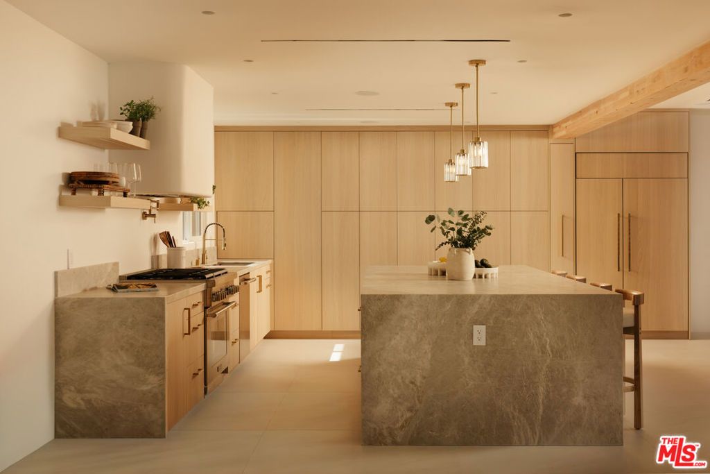 Photo of 880 Teakwood Road, Los Angeles, CA 90049 (MLS # 26664543)