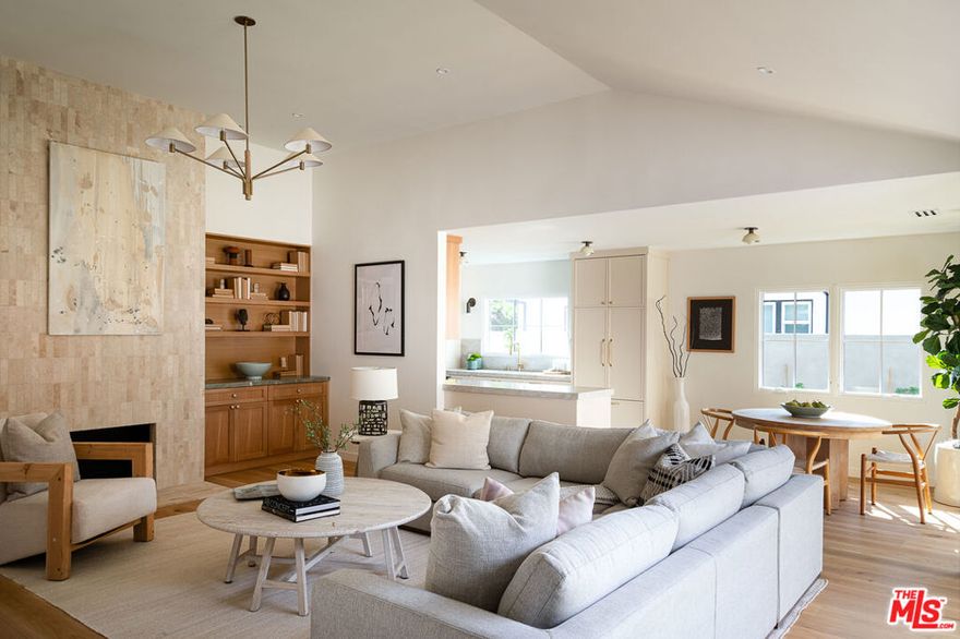 Introducing a beautifully reimagined residence that blends timeless charm with modern luxury. Situated in Valley Village, this home has been completely remodeled with high end finishes and thoughtful details throughout. The main house features 3 bedrooms and 2.5 elegantly updated bathrooms with an open floor plan that flows effortlessly, showcasing living and dining areas for both entertaining and refined everyday living. The converted garage offers endless possibilities whether as a guest suite, office or recreation room  with its own bathroom for elevated comfort and privacy. With large French and bi-folding doors opening out to the new spacious pool, this home is a perfect retreat to enjoy Southern California living. Positioned in prime Valley Village, this home combines convenience and charm just minutes from the highly regarded Colfax Elementary School, Ventura Blvd., and freeway access. Don't miss this opportunity to make it yours!