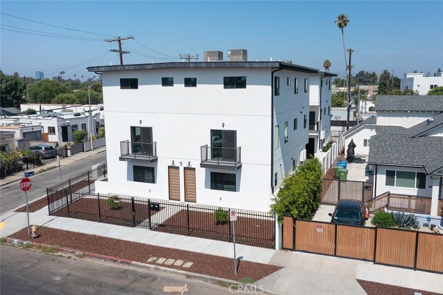 This brand new property, built 2024,, is a fantastic to own as a primary or investment opportunity. It consists of 3 units plus 1 ADU. Each unit offers 5 bedrooms, 5 1/2 bathrooms, and a 2-car garage. The addresses are 4997 and 4995 W 23rd St, and 2231 and 2233 Longwood Ave. 
Each unit is approximately 2,000 sq. ft. and currently occupied by a long-term tenant paying $6,000 per unit, with an annual rent increase of 3.5% and a personal guarantee in place.
The property features breathtaking, brand new smooth walls, up-to-date high-quality flooring and design, contemporary kitchen and countertops, and an open view from upstairs. Situated on a large corner lot, a highlight of this property is the ample parking available outside the property line, and each unit has its own 2-car garage.