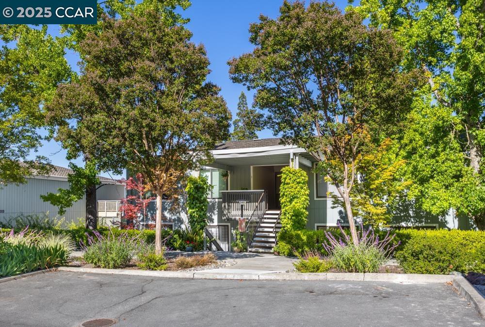 Move-in ready and filled with natural light, this charming 2-bedroom co-op offers fresh paint and stylish luxury plank vinyl flooring throughout the living areas, with cozy carpet in the bedrooms. The updated bathroom includes a convenient in-unit washer/dryer. Step out onto the inviting balcony to enjoy peaceful views of trees and lush grassy areas—perfect for relaxing or entertaining. A great opportunity to enjoy comfortable, easy living in a serene setting.