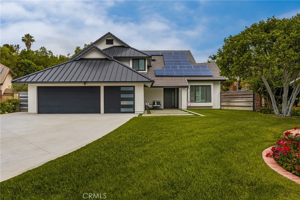 Stunning Turnkey Entertainers Dream Home with Designer Upgrades Throughout!!
Welcome to this impeccably upgraded cul-de-sac residence, featuring a permitted 1,000 sq. ft. pool house complete with a full kitchen and bathroom-perfect for guests, entertaining, or multi-generational living. The main home showcases a fully remodeled chefs kitchen with a large island, custom fold-out window, ZLINE 6-burner stove with griddle, and a Sub Zero refrigerator. Enjoy seamless indoor-outdoor living with custom La Cantina accordion doors, custom built-in Mont Alpi BBQ station, and a backyard oasis like no other- complete with a custom pool/spa, Baja shelf, 75 ft water slide, water/fire features, new lighting, and an outdoor shower. Recent upgrades include: New roof, owned solar, PEX repipe, and new concrete driveway and patios. Dual zone A/C, newer furnace, whole house fan, and Culligan water filtration system. Remodeled bathrooms and laundry room, recessed lighting, epoxy and hardwood flooring throughout. Custom built-ins in the office loft and living room. Newer smooth texture interior/exterior paint, custom vinyl fencing and wood gates. New lighting fixtures, keyless entry front door, Ring Doorbell, and closet organizers. Custom shutters, remodeled fireplace with built-ins, and deck off the primary suite with direct patio access. 2-3 RV parking spaces with private access at top back of property, built-in garage attic storage, retaining walls, and automated irrigation system. Perfectly blending luxury, function and fun, this home is designed for effortless living and unforgettable entertaining. Don't miss this one-of-a-kind opportunity in one of Yorba Linda's most desirable neighborhoods!
