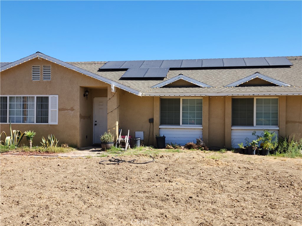 Charming 3-Bedroom Home on a Large Lot! Welcome to a delightful 3-bedroom, 2-bathroom home set on a sprawling 24,393.6 sq ft lot with FULLY PAID SOLAR and a 12'X20' workshop/shed, near the mountains. Offering a serene retreat, this property is perfect for those seeking space, privacy, and endless possibilities to create their dream home. With ample room for RVs, recreational toys, and outdoor projects, this home is a blank canvas ready to be transformed into your haven. Whether you're looking for a peaceful family home or a property with limitless outdoor potential, this is an incredible opportunity you won’t want to miss! Key Features, Expansive Lot – Ideal for Gardening, Storage, or Outdoor Hobbies? Septic System – a self-sufficient feature for rural living. Buyers are encouraged to conduct all necessary inspections and verify all details, including square footage, permits, and renovations. Brokers and agents do not guarantee accuracy. Schedule your private tour today and explore the possibilities!