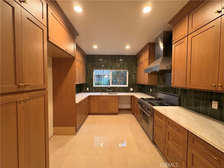 Spacious and well-maintained 5-bedroom, 2.5-bath single-family home offering an ideal blend of comfort, functionality, and modern updates. This move-in-ready residence features a bright and open living and dining area, fresh paint, updated flooring, and a functional kitchen with ample cabinet space and contemporary finishes. All five bedrooms are generously sized with good closet space, while the 2.5 bathrooms offer clean, modern fixtures. The thoughtfully designed layout provides excellent flow for everyday living and entertaining, with added privacy between common areas and bedrooms. Additional highlights include parking availability, and outdoor space. Conveniently located near major streets, public transportation, shopping, dining, and freeway access, making commuting throughout Los Angeles easy.