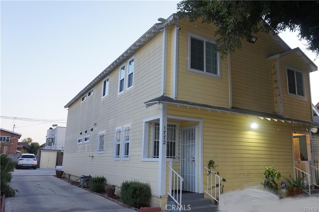Multi-Family Property for sale in Prime West Adams Location, perfect for investors & First time buyers seeking to live in one unit and rent out the other. This Fantastic Multi-Family property features two Units each with 3 spacious bedrooms and 2 bathrooms, offering an incredible investment opportunity or an ideal starter home. Unit 1 is currently owner occupied, while unit 2 is rented, providing immediate rental income potential.
One of the Units is equipped with solar panels, adding long term energy savings and sustainability benefits. Centrally located in the highly sought-after West Adams area, just minutes from the 10 Freeway Entrance, 5 Mts from So-Fi Stadium and a short drive to Downtown Los Angeles, making it an ideal location for tenants or owners looking for convenience and accessibility, close to other major freeways , public transit and entertainment hub. The property is a rare to find with endless potential-whether you are looking to expand your real estate portfolio or secure your First home with the rental Income to help offset the mortgage.