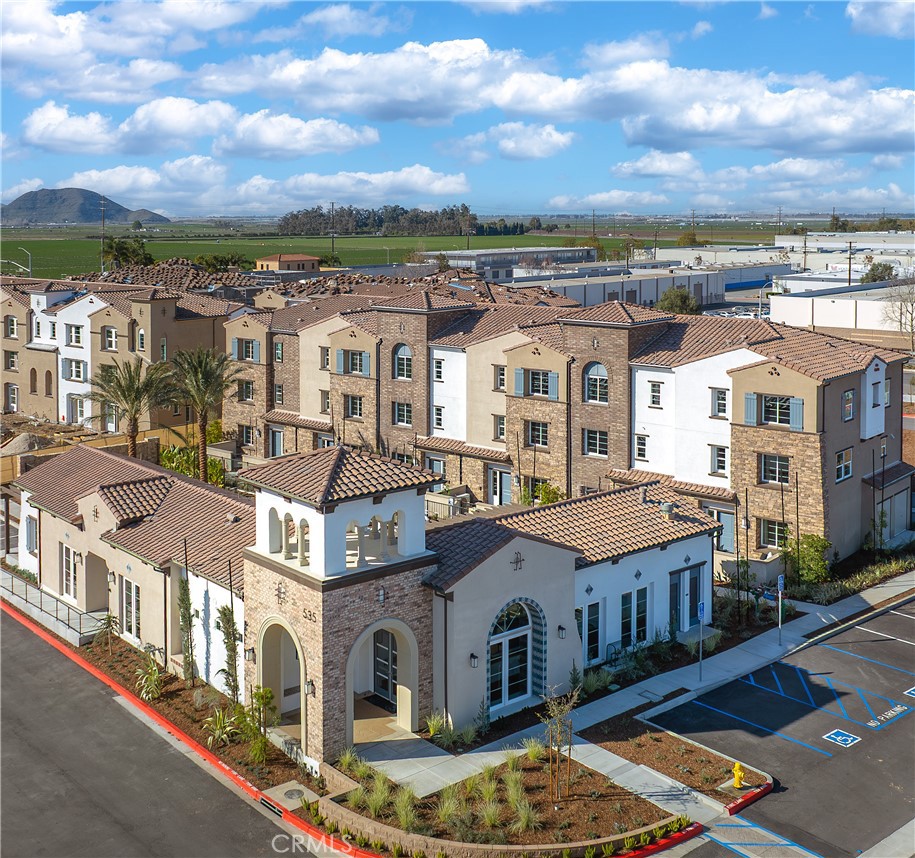 Located in the new fast-selling Camarillo community, Palmera, this beautiful new split level entry townhome offers 2 bedrooms and 2.5 baths and also comes with a spacious bonus room that offers you unlimited options. Palmera will offer a full gym, 2 pools, study space, a clubhouse and a dog park as well as onsite shopping and dining!
Palmera is a new vibrant townhome community located in the city of Camarillo. With a moderate Mediterranean year-round climate, Camarillo is considered by many to have the best weather on earth. Palmera is the place you will want to call home, located next to miles of beautiful farmland but close to all the amenities Camarillo has to offer. We are just 15 minutes to gorgeous coastline and beaches, the legendary Camarillo Outlets, and less than a moment’s drive to the Metro Link/Amtrack station. Palmera is just a stroll to Old Town which offers great restaurants, bars, boutique shops, salons, art, and entertainment. Not to mention the farmers market every weekend. There is a first-floor bonus room that can function from a home office to a game room and everything in-between! The second floor with 9' ceilings is open concept with eat in kitchen, spacious dining and living areas perfect for family fun and entertaining friends. All bedrooms are on the 3rd floor which also offers 9' ceilings. Pictures ae of model home, location and finishes will vary.