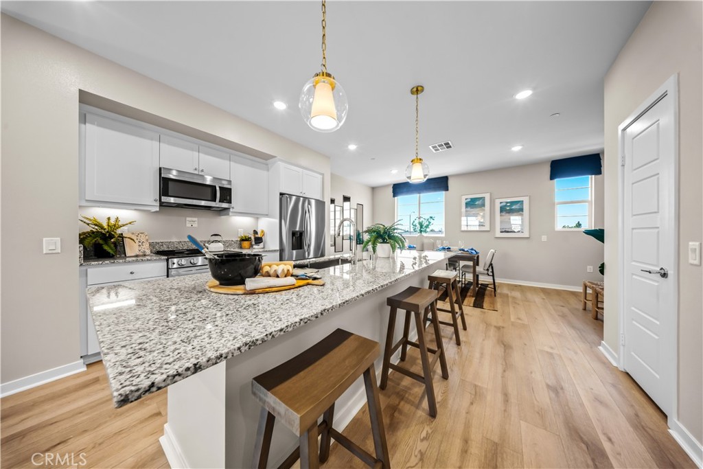 Located in the new fast-selling Camarillo community, Palmera, this beautiful new split level entry townhome offers 2 bedrooms and 2.5 baths and also comes with a spacious bonus room that offers you unlimited options. Palmera will offer a full gym, 2 pools, study space, a clubhouse and a dog park as well as onsite shopping and dining!
Palmera is a new vibrant townhome community located in the city of Camarillo. With a moderate Mediterranean year-round climate, Camarillo is considered by many to have the best weather on earth. Palmera is the place you will want to call home, located next to miles of beautiful farmland but close to all the amenities Camarillo has to offer. We are just 15 minutes to gorgeous coastline and beaches, the legendary Camarillo Outlets, and less than a moment’s drive to the Metro Link/Amtrack station. Palmera is just a stroll to Old Town which offers great restaurants, bars, boutique shops, salons, art, and entertainment. Not to mention the farmers market every weekend. There is a first-floor bonus room that can function from a home office to a game room and everything in-between! The second floor with 9' ceilings is open concept with eat in kitchen, spacious dining and living areas perfect for family fun and entertaining friends. All bedrooms are on the 3rd floor which also offers 9' ceilings. Pictures ae of model home, location and finishes will vary.