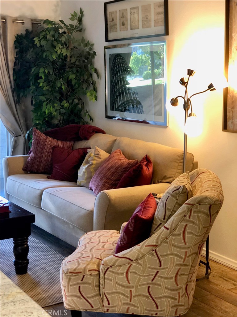 FURNISHED RENTAL. Available now. Furnished. Gorgeous! Remodeled light and bright condo. Laguna Woods Village is one of the premier 55+ age-restricted gated communities. Hard surface flooring as well as all NEWER KITCHEN APPLIANCES. Assigned carport parking close by. No stairs to access unit. Dining area with seating for 4. There are 2 baths & 2 bedrooms: king bed in primary and a queen bed in the other. The primary bath has a sink, make-up vanity and a walk-in shower. A designated carport spot close by, and stackable washer dryer inside the unit. Residents enjoy special interest activities including fitness centers, swimming pools, golf, tennis, yoga, lawn bowling, Pickleball, table tennis, shuffleboard, bridge, photography lab/darkrooms, arts and crafts, a computer-learning center, equestrian center, performing arts center. ONE PERSON ON THE LEASE MUST BE 55 YEARS OR MORE.